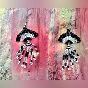 Dangle beaded retro vintage dangle earrings in black and iridescent white.
